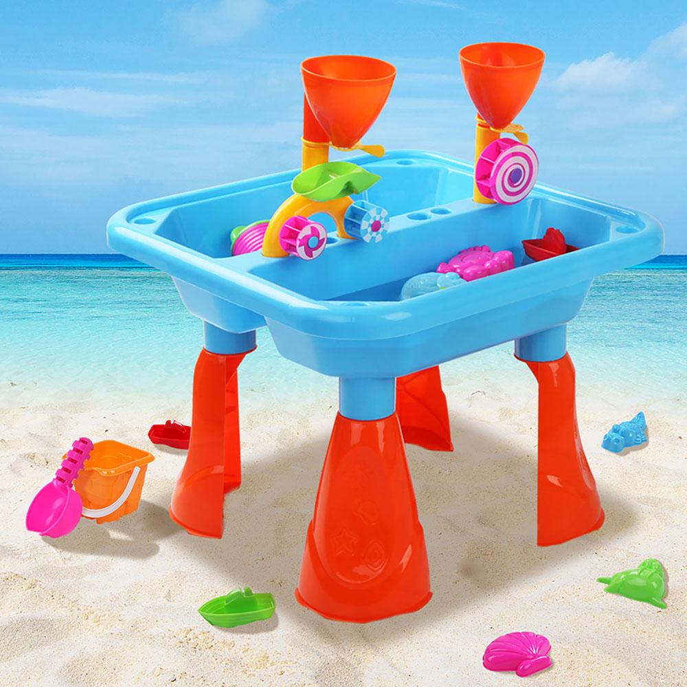 Keezi 23 Piece Kids Play Table Set featuring colorful sand and water play accessories including boats, moulds, and tools for outdoor fun.